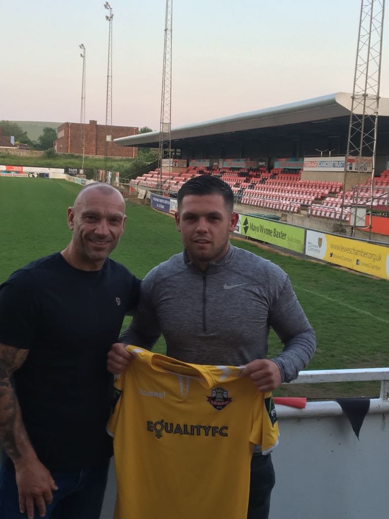 Winnie hands the gloves to Carey