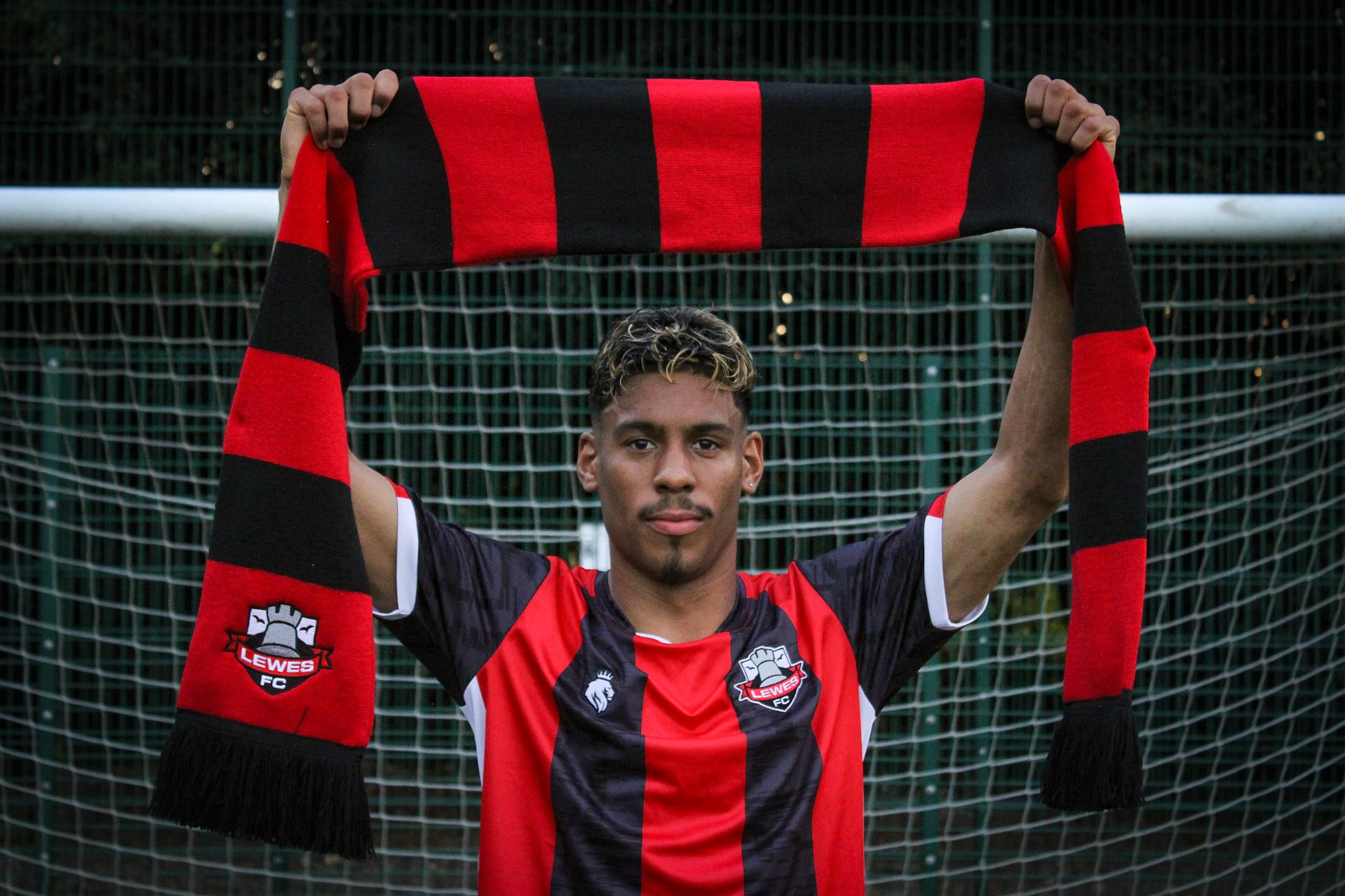 Lewes sign versatile wide player Cox